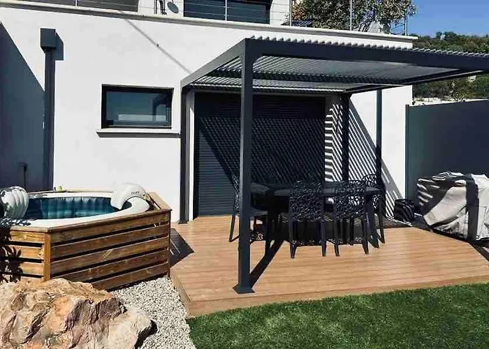 Appartement En Rez-de-chaussée De - Classification 3 étoiles