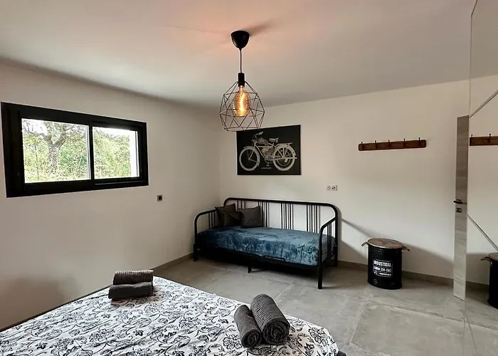 Appartement En Rez-de-chaussée De - Classification 3 étoiles *